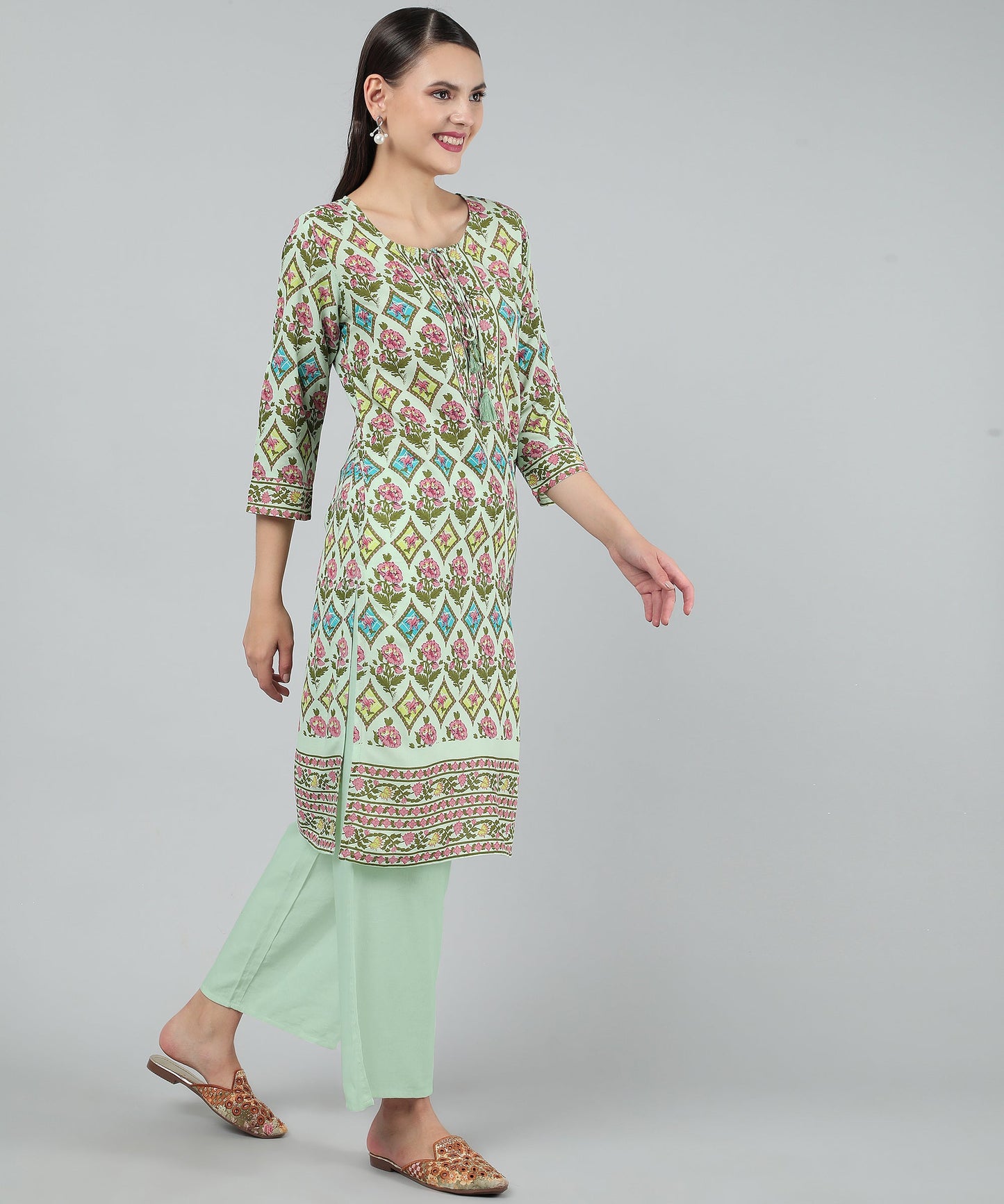 Pritned Rayon Cotton Kurti with Keyhole Neck Tassels and Drawstring,Green